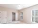 Cozy bedroom with ample closet space and window at 20 Saint Croix Way, Englewood, FL 34223