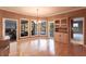 Bright breakfast nook with pool view and built-in hutch at 20 Saint Croix Way, Englewood, FL 34223
