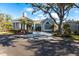 Elegant clubhouse with a welcoming entrance and well-maintained landscaping at 20 Saint Croix Way, Englewood, FL 34223