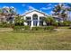 Elegant community clubhouse with landscaped grounds at 20 Saint Croix Way, Englewood, FL 34223