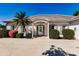 Front view of house showcasing entryway and landscaping at 20 Saint Croix Way, Englewood, FL 34223