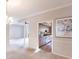 View into kitchen with granite countertops from dining room at 20 Saint Croix Way, Englewood, FL 34223