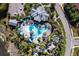 Aerial view of community pool with surrounding lounge areas at 20 Saint Croix Way, Englewood, FL 34223