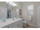 Clean bathroom with single vanity and shower/tub combo at 205 Tortuga Dr, Nokomis, FL 34275