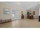 Bright dining room with hardwood floors and a view to the outdoors at 205 Tortuga Dr, Nokomis, FL 34275