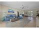 Living area featuring a light and airy design with ample natural light and comfortable seating at 205 Tortuga Dr, Nokomis, FL 34275