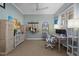 Home office space with desk, chair, and ample storage at 205 Tortuga Dr, Nokomis, FL 34275