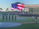 Evening at the ballpark featuring a flag ceremony and a large screen at 23210 Banbury Way # 101, Venice, FL 34293