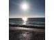 Stunning sunset over the ocean waves at 23210 Banbury Way # 101, Venice, FL 34293