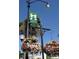 Welcome to Historic Venice, Florida. Charming street view with hanging baskets at 23210 Banbury Way # 101, Venice, FL 34293