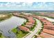 Aerial view of Sarasota National, showcasing a single-Gathering home and community at 23402 Copperleaf Dr, Venice, FL 34293