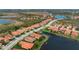Aerial view highlighting home's lakefront location at 23402 Copperleaf Dr, Venice, FL 34293