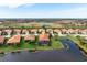 Wide aerial view of community and home location at 23402 Copperleaf Dr, Venice, FL 34293