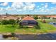 Aerial view of home with pool and backyard at 23402 Copperleaf Dr, Venice, FL 34293