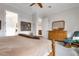 Bright bedroom with wooden furniture and neutral color scheme at 23402 Copperleaf Dr, Venice, FL 34293