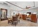 Open concept dining area with seating for four and kitchen views at 23402 Copperleaf Dr, Venice, FL 34293