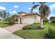 Beautiful one-story home with landscaping and driveway at 23402 Copperleaf Dr, Venice, FL 34293