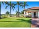 View of the golf course with parked golf carts at 23402 Copperleaf Dr, Venice, FL 34293