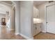 Built-in hallway cabinetry with granite countertop and ample storage at 23402 Copperleaf Dr, Venice, FL 34293