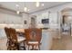 Modern kitchen with an island and stainless steel appliances at 23402 Copperleaf Dr, Venice, FL 34293