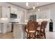 Modern kitchen with stainless steel appliances and island at 23402 Copperleaf Dr, Venice, FL 34293