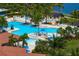 Large resort-style pool with plenty of lounge chairs at 23402 Copperleaf Dr, Venice, FL 34293