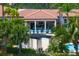 Relaxing pool area with bar and lounge chairs at 23402 Copperleaf Dr, Venice, FL 34293