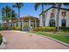 Community pool and fitness center with inviting landscaping at 23402 Copperleaf Dr, Venice, FL 34293