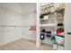 Large walk-in closet with wire shelving and ample hanging space at 23402 Copperleaf Dr, Venice, FL 34293