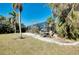 Relaxing backyard oasis featuring a screened pool area and comfortable seating at 237 San Marco Dr, Venice, FL 34285