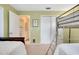 Bedroom with twin beds, closet, and door to hallway at 237 San Marco Dr, Venice, FL 34285
