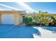 House exterior with attached garage and landscaped front yard at 237 San Marco Dr, Venice, FL 34285