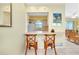 Bright kitchen features white cabinets, and modern appliances at 237 San Marco Dr, Venice, FL 34285
