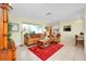 Spacious living room with ample natural light and comfortable seating at 237 San Marco Dr, Venice, FL 34285