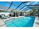Expansive pool and patio area with screened enclosure at 237 San Marco Dr, Venice, FL 34285