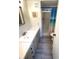 Bathroom with vanity, shower, and toilet at 28 Castaway Ct, North Port, FL 34287