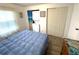 Bedroom with full bed, washer, dryer and closet at 28 Castaway Ct, North Port, FL 34287