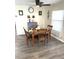 Charming dining room featuring a wood table and four chairs at 28 Castaway Ct, North Port, FL 34287