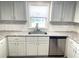 Modern kitchen with stainless steel appliances and granite countertops at 28 Castaway Ct, North Port, FL 34287