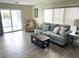Comfortable living room with a sofa and a coffee table at 28 Castaway Ct, North Port, FL 34287