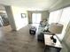 Comfortable living room with a sofa and a coffee table at 28 Castaway Ct, North Port, FL 34287