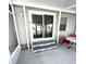 Screened-in porch with access to the interior of the home at 28 Castaway Ct, North Port, FL 34287
