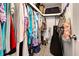 Well-organized walk-in closet with ample hanging space at 3022 Audubon Ave, Englewood, FL 34224