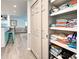 Well-organized linen closet with sliding doors and ample shelving at 3022 Audubon Ave, Englewood, FL 34224