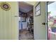 Convenient laundry room with washer, dryer, and extra storage at 3022 Audubon Ave, Englewood, FL 34224