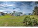 View of backyard and neighboring homes at 3036 Audubon Ave, Englewood, FL 34224