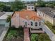 Property overview showcasing the home's Spanish-style architecture and pool at 321 Pedro St, Venice, FL 34285