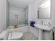 Modern bathroom with updated fixtures and a walk-in shower at 321 Pedro St, Venice, FL 34285