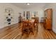 Bright dining room with hardwood floors and antique furniture at 321 Pedro St, Venice, FL 34285