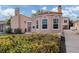 Spanish style home with driveway and lush landscaping, offering curb appeal at 321 Pedro St, Venice, FL 34285